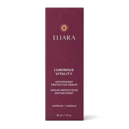 A tall, rectangular box of Eliara Luminous Vitality antioxidant protective serum, featuring a deep burgundy cover with white text and a small gold sunburst logo, set against a plain white background.