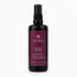 A 100 ml black spray bottle of Eliara Mystic Elixir Pinot Noir microbiome mist, featuring a deep burgundy label with gold and white text, set against a clean white background.